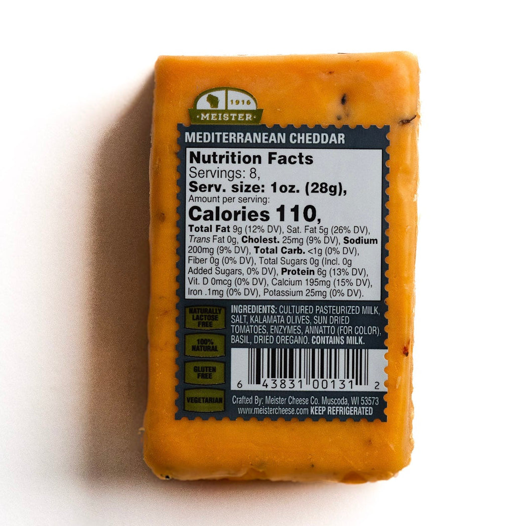 Block of Meister Mediterranean Cheddar cheese with a nutrition facts