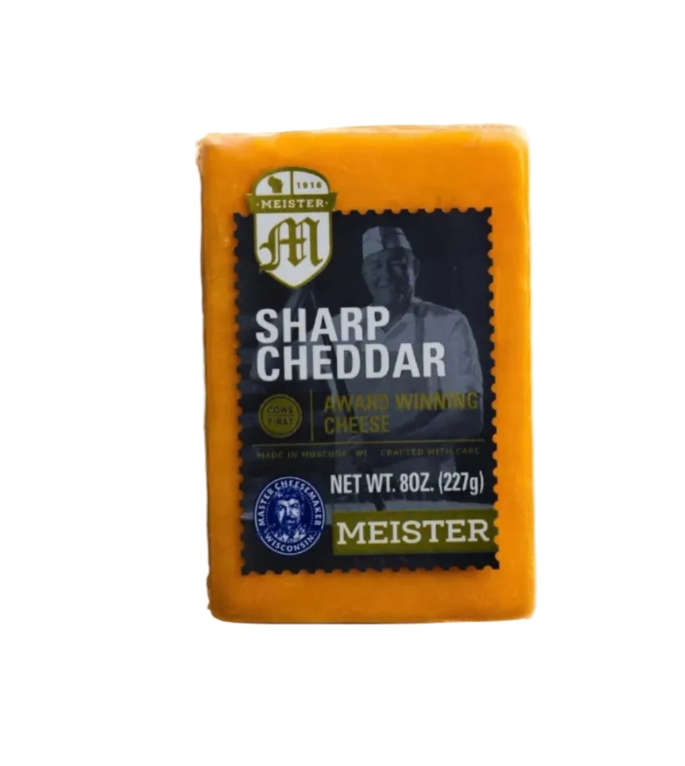 Block of Meister Sharp Cheddar cheese on a white background