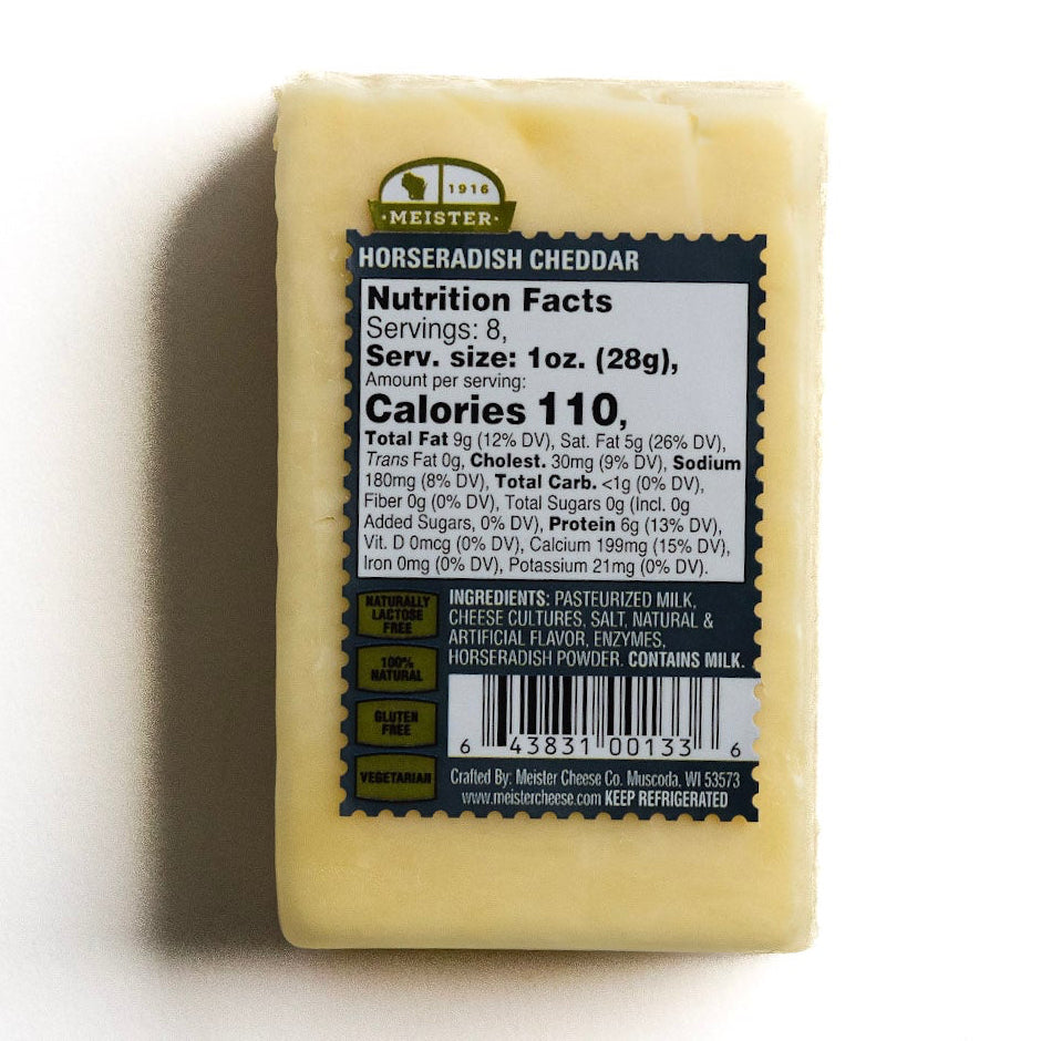 Block of Meister horseradish cheddar cheese with a nutrition label