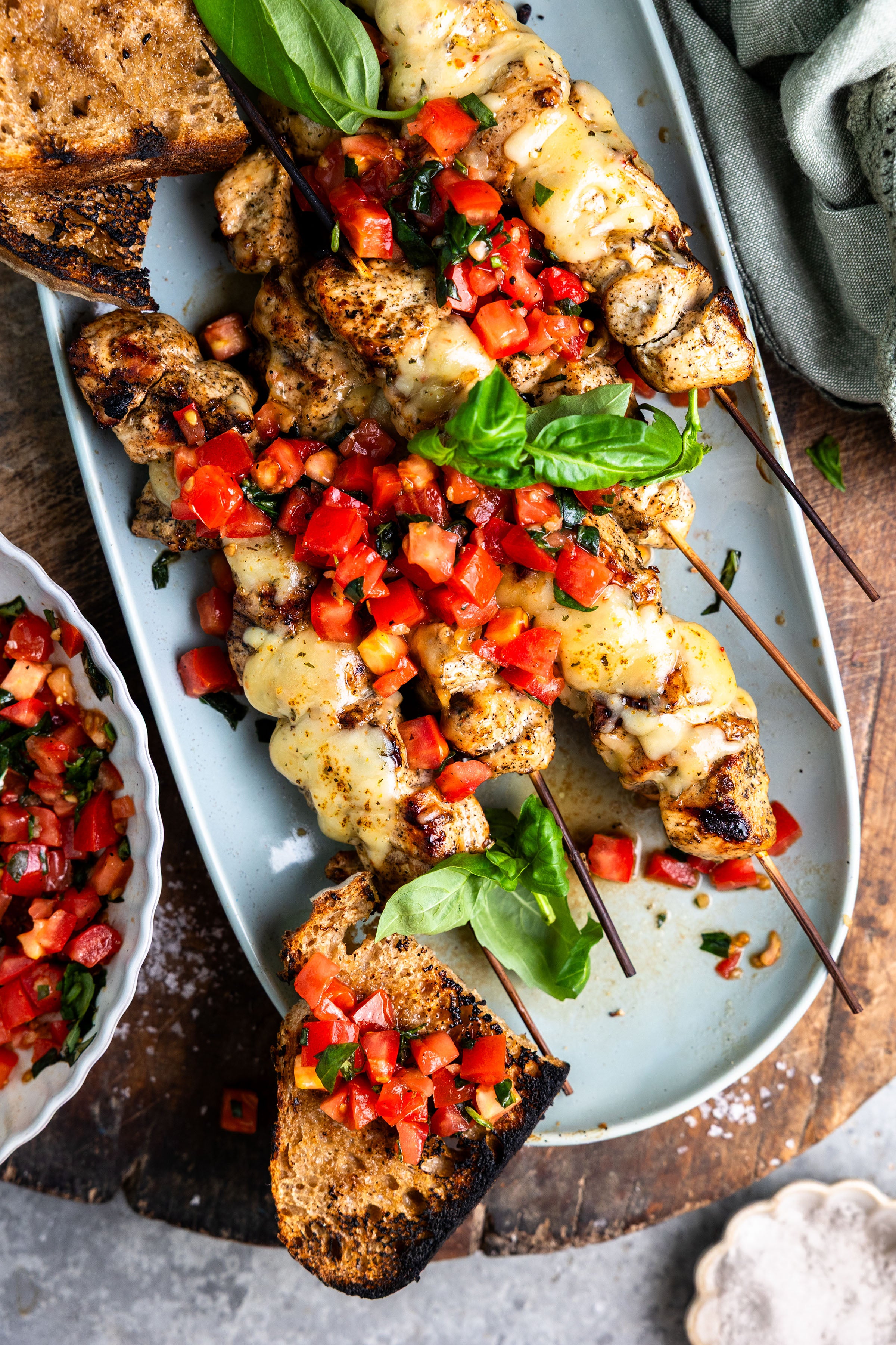 GRILLED CHEESY BRUSCHETTA CHICKEN SKEWERS