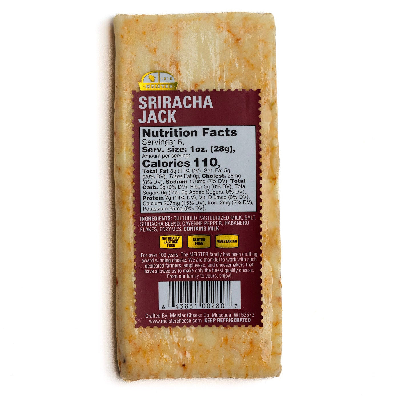 Block of Meister Sriracha jack cheese with a nutrition facts label on a white background